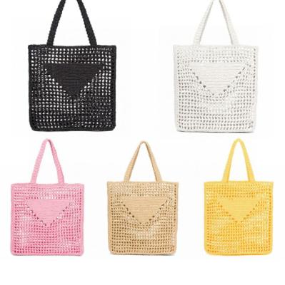 China New promotion eco-friendly gift rope crochet paper bag hollow out woven single shoulder ladies bag for sale