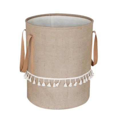 China Folding Collapsible Burlap Fabric Storage Bucket Toy Sundries Storage Basket with White Tassels for sale