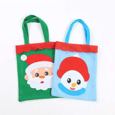 China Christmas Promotional Gifts felt bag Cookies Candy Packing handbag Bag Custom Cute Children Felt Tote Bag for sale