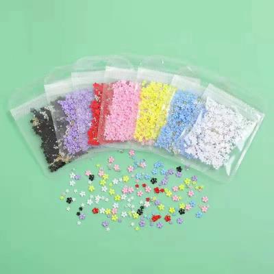 China Plastic resin 3 d popular mini edelweiss color nail art golden charm ball nail for sale