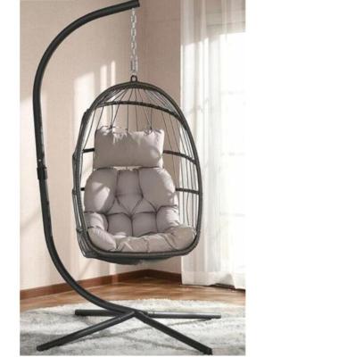 China Modern Rattan Folding Balcony Garden Swing Egg Chair Wicker Hanging Hanging Chair With Metal Stand for sale