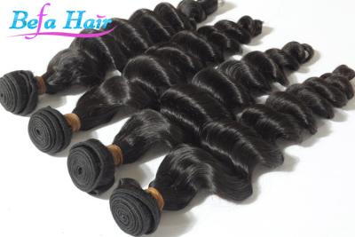 China El pelo malasio de la Virgen de la onda floja lisa, negro natural/destacó extensiones del pelo en venta