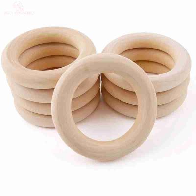 China Eco-Friendly Gift Wholesale Wooden Crafts Natural Teether Ring 40-70mm Log Teether DIY Accessory for sale