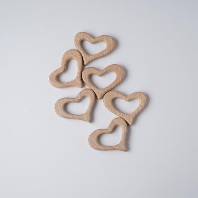 China Natural Baby Love Hearts Shaped Beech Wooden Teether Baby Wooden Teether for sale