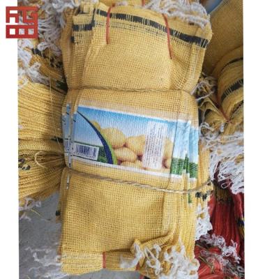 Κίνα PP Woven Vegetables Packing Onion Potatoes Garlic garbage mesh bags προς πώληση