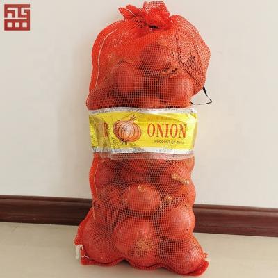 China PP Mesh Bag with Label Vegetables Packing Onion Potatoes Garlic Packing Bags 20kg 25kg 30kg Screen Printing Heat Seal Zs Accept en venta