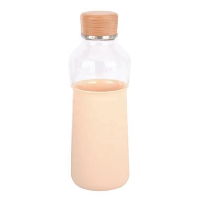 China Hot Selling Borosilicate Glass Drinking Glass Custom Lead Free Water Bottle Viable With Silicone Sleeve for sale