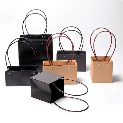 China 2020 Fashion Recyclable Durable Dirty Resistant Seller Square Black Paper Gift Bag for sale