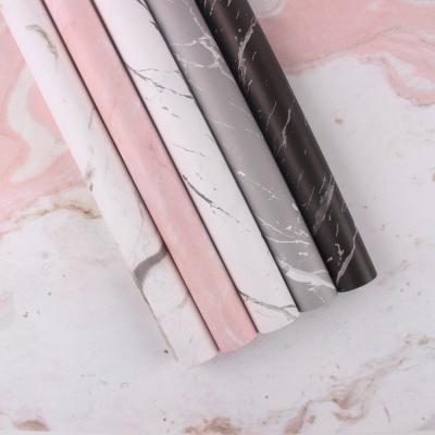 China New Art Paper Marble Moisture-proof Pattern Thickening Individual Florist Gift Material Paper Wrapping With Logo Florist Wrapping Paper for sale