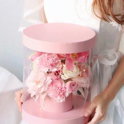 China Gift Wrapping Round Transparent Clear Flower PVC Embrace Bucket Luxury Gift Box With Ribbon Florist Wedding Surprise Gift Box for sale