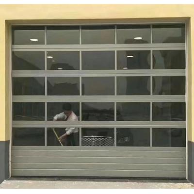 China Modern Design Folding Screen Glass Roll Up Sectional Door Suitable For Supermarket /Exhibition Hall for sale