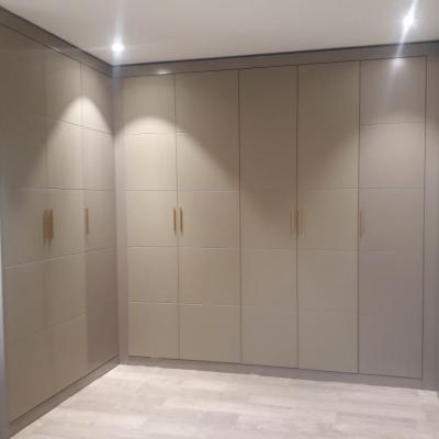 China Modern Luxury Leather Bedroom Wardrobe Door Design Custom U Shaped Wardrobe With Doors for sale