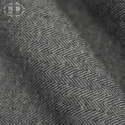 China DIMENSIONAL Stain Black and Gray Herringbone Wool Blended Cloth 472g Spring and Winter Coat Fabric for Men and Women's Clothing for sale