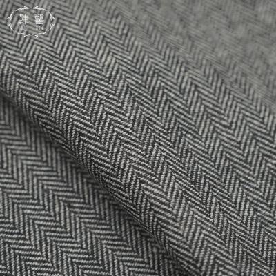 China DIMENSIONAL Stain Black And Gray Herringbone Pattern Coat Fabric 489g Spring Fall And Winter Men And Women Coat Skirt Wool Fabric for sale