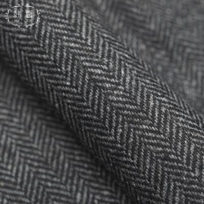 China DIMENSIONS Stain Womens Wool Blended Wool Fabric 477g Black And Gray Herringbone Coat Woolen Cloth Fabric for sale