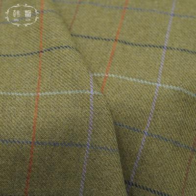 China Woolen fabric green twill woolen fabric woolen spring skirt wool spot plaid woolen coat viable square green twill fabric and autumn coat for sale