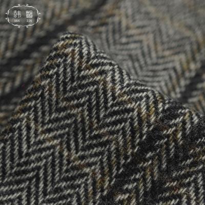 China Sustainable 100%woolen wool tweed fabric 500g herringbone spring autumn and winter men's and women's wool coats clothing fabric for sale