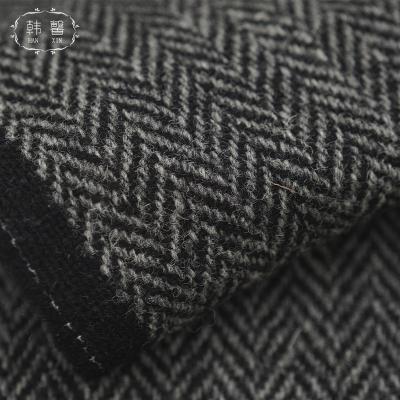 China Black And Gray Herringbone Fabric 500g Viable Stain Full Wool Tweed Fabric Spring And Skirt Autumn Suit Jacket for sale