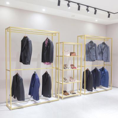 China Modernization Fashion Style Gold Metal Clothing Rack Display Rack Gold Garment Display Rack for sale