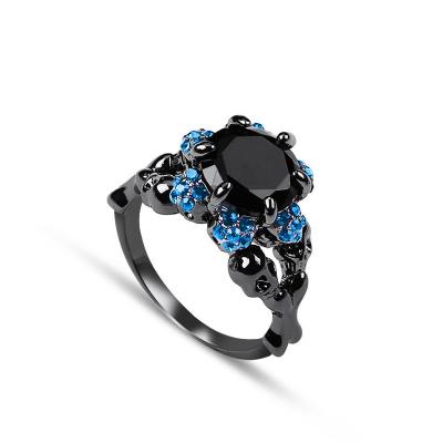 China 2019 Punk Jewelry Flower Skull Pattern Decorated Colorful Gemstone Black Gold Black Top Selling Mysterious Ring for sale