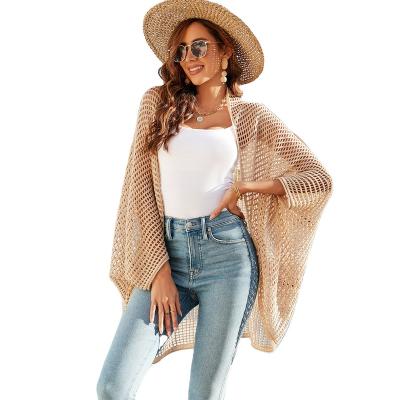 China Anti-wrinkle knitted sweater cardigan 2023 summer new dug seaside beach sexy vacation women's plus size women's coats for sale