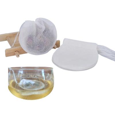 China Custom Creative Round Shape Tea Filter Paper Tea Bags With Strings 75MM Diameter Loose Leaf Packing Pouches (100pcs/bag) for sale