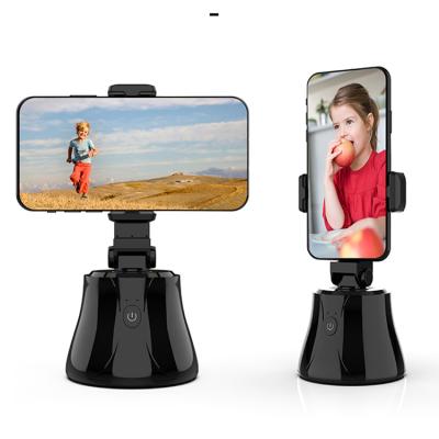 China Face or Lens Auto Tracking Custom Camera Logo Face Tracking Object Vlog Shooting Auto Smart Tracking Selfie Phone Holder for sale