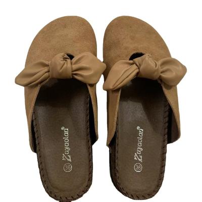 China Damping 2022 tide brand style Baotou half slippers of retro frosted bow leather slippers flat bottom thick bottom non-slip casual sandals for sale