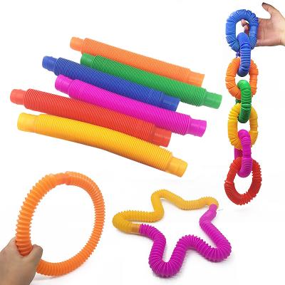 China Stress Relief Plastic Sensory Toys Decompression Hose Stretch Colorful Busy Person Tube Toys Educational Funny Plastic Decompression Sensory Toys Tube Reel for sale