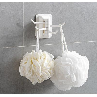 China Viable Creative Revolving Non-perforated Towel Bath Brush Storage Rack With Four Hooks Bathroom Wall Hanging Rack for sale