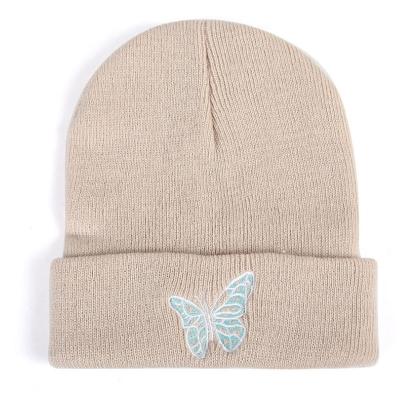 China JOINT factory best selling winter hats knitted color flat butterfly soild jacquard embroidery beanie infant hat for sale