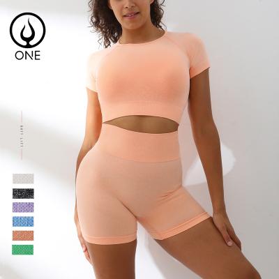 China Breathable women's seamless 2 piece yoga sets sleeve short crop tops and high waist butt shorts crack! crack! in solid color for sale