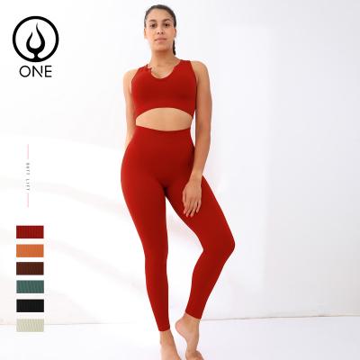 China Breathable 2-Piece Ribbed Yoga Sets V-Neck Sleeveless Crop Tops With Removable Pads And Seamless High Waisted Gaiters In Solid Colors for sale