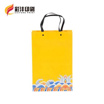 China Disposable Custom Logo Printed Gift Luxury Shopping Paper Bag With Your Own Logo for sale