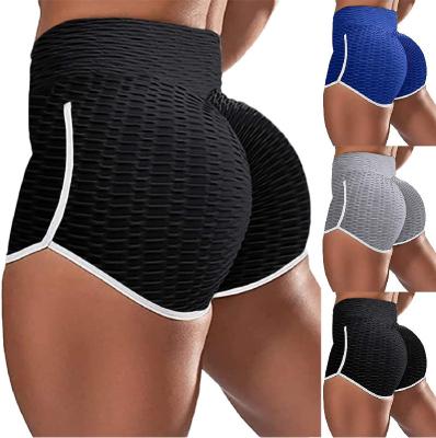 China New 2021 summer QUICK DRY women's clothing quick dry yoga shorts solid color bubble sexy ribbed yoga shorts for sale