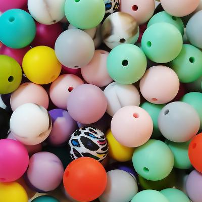 China Wooden Round 100pcs/bag 12mm 15mm Silicone Beads Food Grade Biteable Diy Baby Teether Molar Scattered Bead for sale