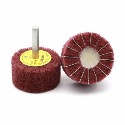 China Polishing  High quality non-woven flap wheel with shaft wearable non-woven abrasive wheel for sale