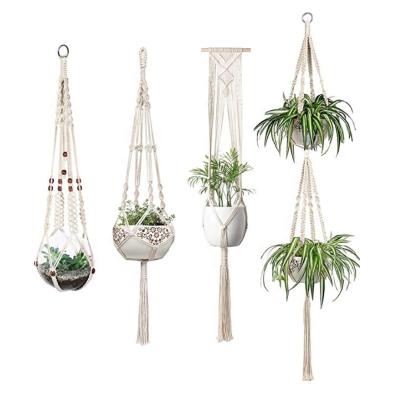 China Amazon Hot Selling Home Decoration Apartment Bedroom Living Room Gallery 4 Pack Macrame Plant Hanger Set Sand Flower Pots for sale