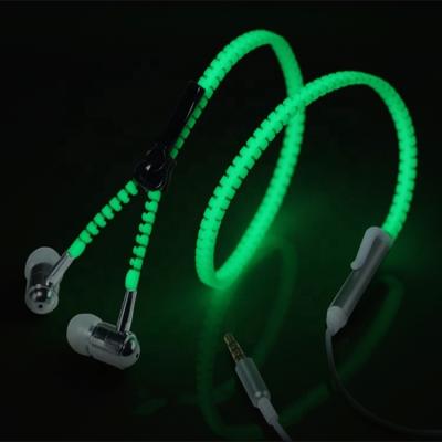 China Glow in Dark Wholesale Zipper Earphone Glowing in Dark Stereo Headset LED Earphone for sale