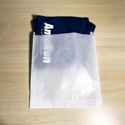 China Recycled Materials Kraft Biodegradable White Wax Coated Paper Bag / Waterproof Paper Bag For Clothing for sale