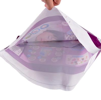 China Custom Printing Safety Side Gusset Disposable Baby Diaper Packaging Bag With Handle for sale