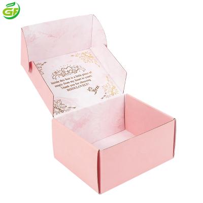 China Handmade Customized Pink Printed Foldable Paper Packaging Cardboard Gold Stamping Mailer Box E Pipe Corrugated Gift Box for sale