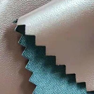 China Quality Assurance Waterproof Soft Feeling Customized PU Leather Plain Dyed Fabric For Clothes for sale