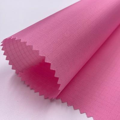 China Free Sample Waterproof Light Weight 0.2CM*0.2CM PA Coated 210T Polyester Ripstop Taffeta Fabric For Bag for sale