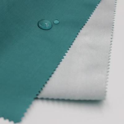 China Plain 210T Waterproof Polyester Taffeta Waterproof Fabric With Silver Coating for sale