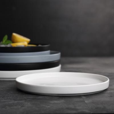 China Sustainable Nordic dish take care white dishes round porcelain dishes new ceramic dishes design for sale