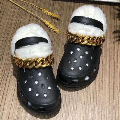 China Other gold chain rivet hairy sandals women hole garden shoes with fur thump 2021 new winter warm shoes female slip on sandals hairy fur for sale