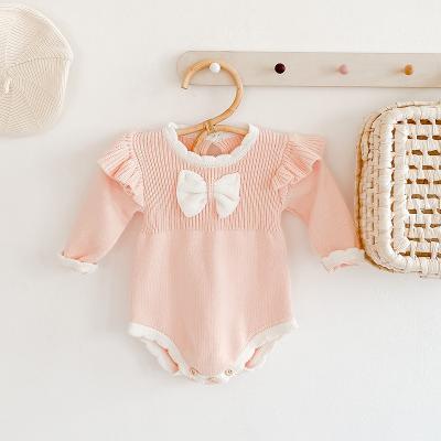 China New Winter Plain Cotton Pink Color Growing Jeans Baby Clothes 100% Organic Cotton Romper With Bow Baby Girl Newborn Baby Clothes for sale