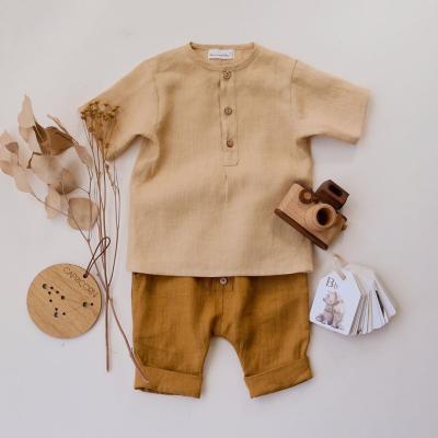 China 2022 Wholesale Washable Yellow Newborn Toddler Summer Clothing Custom Made Short Sleeve Tops And Pants Baby Boy Clothing Set for sale