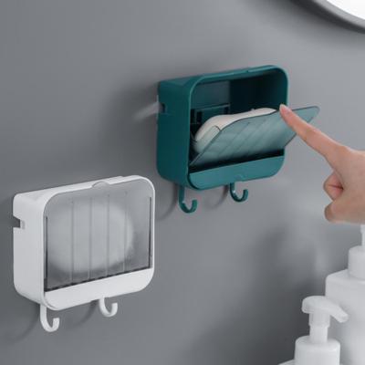 China Draining Wall Mounted Flowing Soap Box With Water Storage Board Bathroom Soap Box Toilet Shelf Flip-Open Box With 2 Hooks for sale